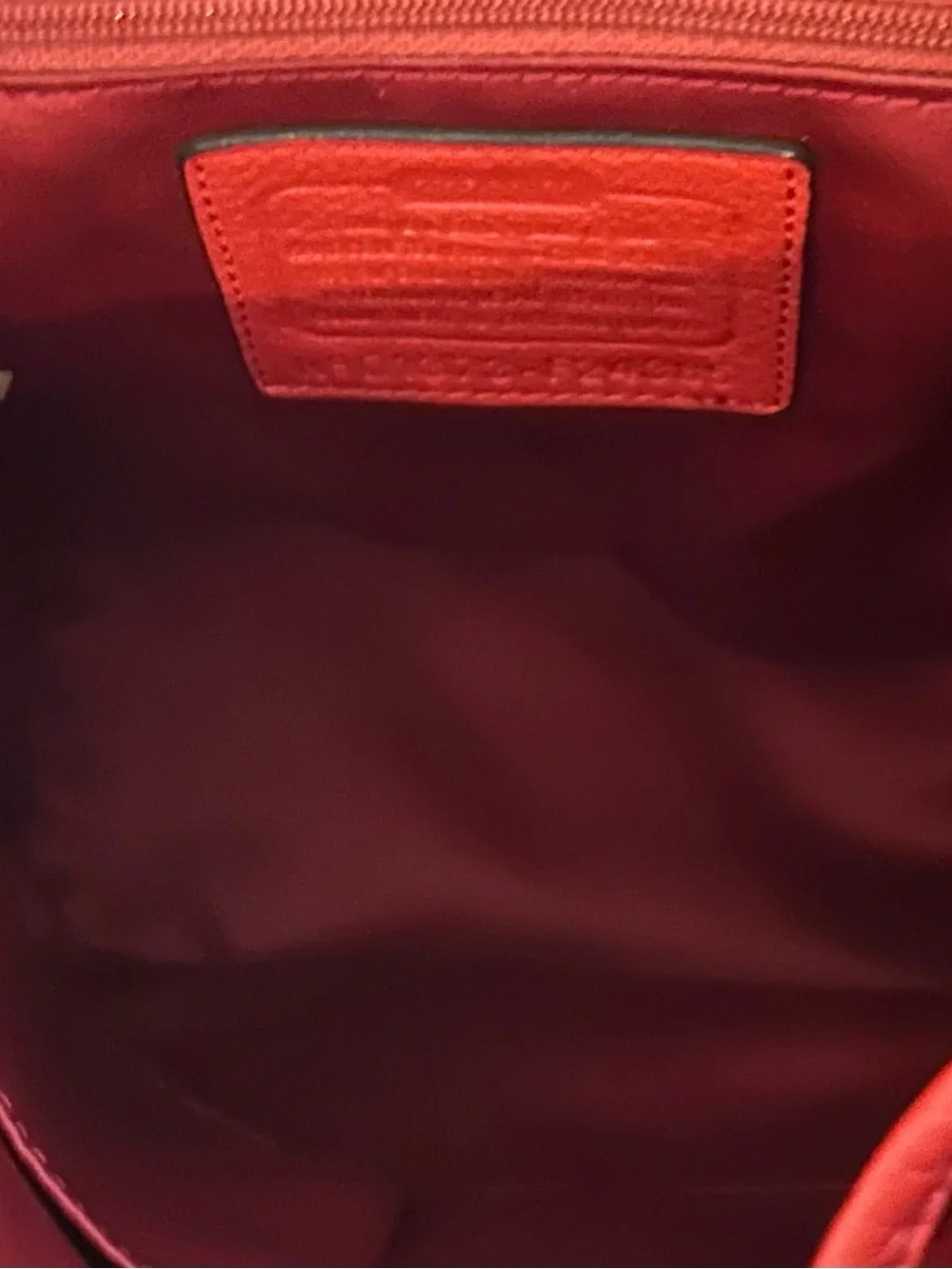 Coach Red Pebbled Leather Turnlock Drawstring Backpack Top Handle F24385